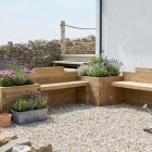 Banco con asiento doble para jardinera / 300 x 300 x 75 cm